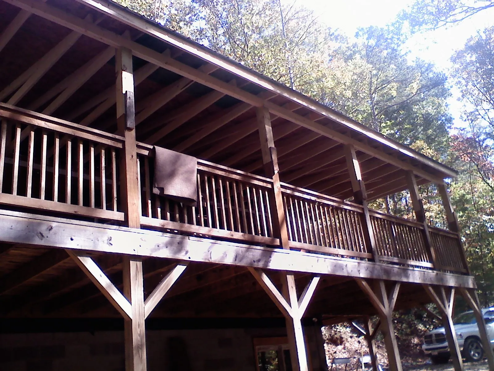 Timber framing under a new elevated porch and deck — Roof Leak Repair in Peosta by Roofing Brothers